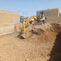 ارائه خدمات بیل میکانیکی لاستیکی حسن پور