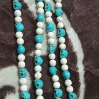 یه عدد تسبیح ۱۰۱عددی فیروزه نیشابور رنگ آبی وسفید