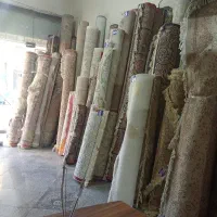 کارگر قالیشویی بالا پایین کردن فرش