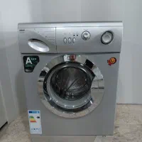 ماشین لباسشویی کارکرده حمل ضمانت رایگان اسنوا۷کیلو