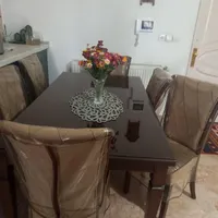 میز ناهار خوری شش نفره همراه با روکش صندلی