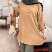 خیاط،دوزنده،چرخکار ماهر و اتوکار خانم در تولیدی