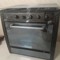 اجاق گاز مشکی پنج شلعه تمیز