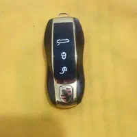 گوشی موبایل مینی بندانگشتی ( طرح ریموت پورشه )