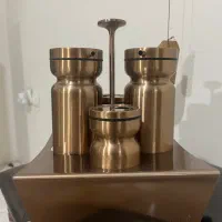 نمک و فلفل پاش و ظرف روغن و آب لیمو