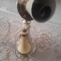 ساعت دیواری وچراغ شب طرح تلفن خیلی قدیمی