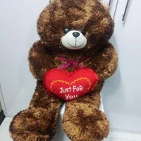 عروسک خرس قهوه ایی