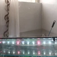 اکواریم شیشه خم با میز