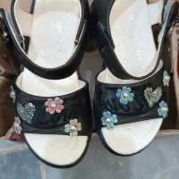 کفش و لباس بچه گانه