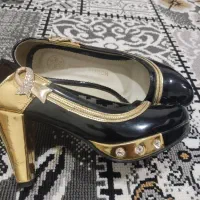 کفش|کیف، کفش، کمربند|گتوند, |دیوار