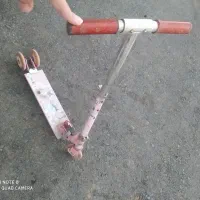 اسکوتر صورتی