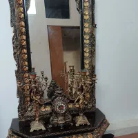 اینه و شمعدان وساعت