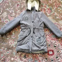 یک عدد کاپشن دخترانه... یک عدد شال و کلاه دخترانه