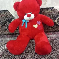 عروسک خرس قرمز