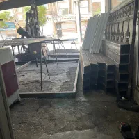کارگر درب وپنجره ساز آهنی