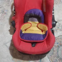 صندلی ماشین کودک و ساک حمل نوزاد