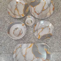 ملامین طرح سنگ طوسی و طلایی