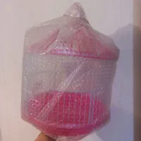 قفس و اسباببازی عروس هلندی