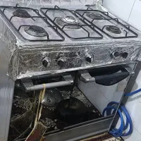 اجاق گاز طرح فر پنج شعله در حد نو