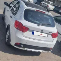 کوییک ار مدل ۴۰۲ پارس خودرو سفید مشکی