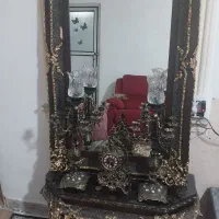 آیینه شعمدان و ساعت