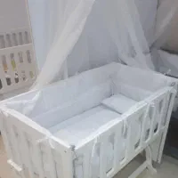 تخت گهواره ای کنار مادر نوزاد، کودک
