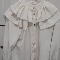 لباس دخترانه|لباس|رباط‌کریم, رباط‌کریم|دیوار