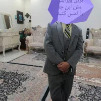 کت و شلوار و جلیقه و پیراهن و پاپیون