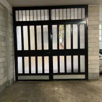 فروش  دو لنگه درب پارکینگ آهنی دست دوم