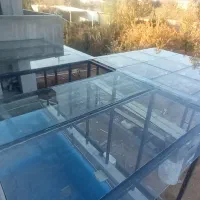 تهیه و اجرای دربهای شیشه ای سکوریت و لمینت