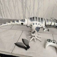 اسباب بازی دایناسور باتری خور