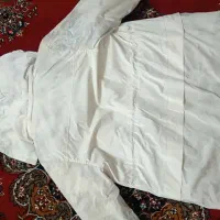 کاپشن سفید سیلیکونی|لباس|الیگودرز, |دیوار