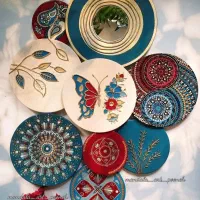 دیوارکوب سفالی طرح آینه ی پروانه