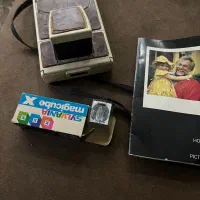 دوربین قدیمی‌با تمام لوازم