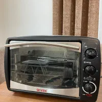 توستر صفحه شیشه ای در حد نو