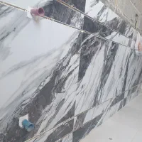 شاگرد کاشی کار میخام