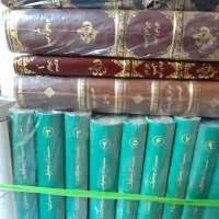 قرآن رهنما ۴ جلد|کتاب و مجله تاریخی|تهران, میدان ولیعصر|دیوار