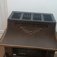 بخاری گازی طرح شومینه