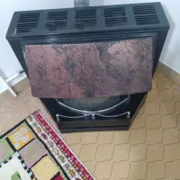 یک عدد بخاری ظریف گاز طرح شومینه کارکرده|بخاری، هیتر، شومینه|رباط‌کریم, الارد|دیوار