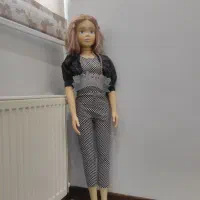 عروسک باربی وحلقه ی کمر و قغسه