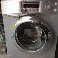 یک عدد لباس شوی تمیز 7کیلوی