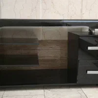 میز تلویزیون شیشه ای کاملا سالم