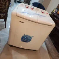 ماشین لباسشویی برف اب