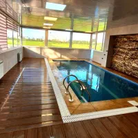 ویلا سه خواب استخر آبگرم منطقه آزاد انزلی|اجارهٔ کوتاه‌مدت ویلا و باغ|بندر انزلی, گلشن|دیوار