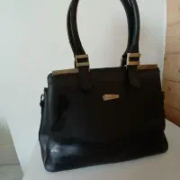 کیف زنانه|کیف، کفش، کمربند|ری, جوانمرد قصاب|دیوار