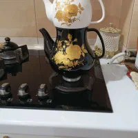 ظروف کتری قوری نو استفاده نشده باجعبه شعله مستقیم