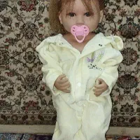 عروسک سیلیکونی همراه با لباس اضافه