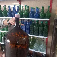 بطری شیشه ای ۸لیتری|ظروف نگهدارنده، پلاستیکی، یک‌بارمصرف|اصفهان, باغ فدک|دیوار
