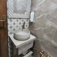 روشویی سنگی همراه با ایینه
