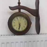 ساعت دیواری چوبی دورویه